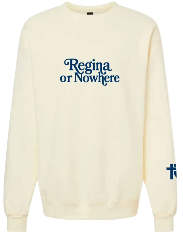 An off-white crewneck sweatshirt featuring the text 'Regina or Nowhere' printed in dark blue across the chest, with a matching blue graphic on the right sleeve.